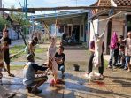 momen-bahagia-pembagian-daging-kurban-beri-kebahagiaan-warga-28565 Momen Bahagia: Pembagian Daging Kurban Beri Kebahagiaan Warga