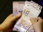 Rupiah Tembus Rp18.000, Ringgit Menguat: Beda Nasib Mata Uang RI vs Malaysia